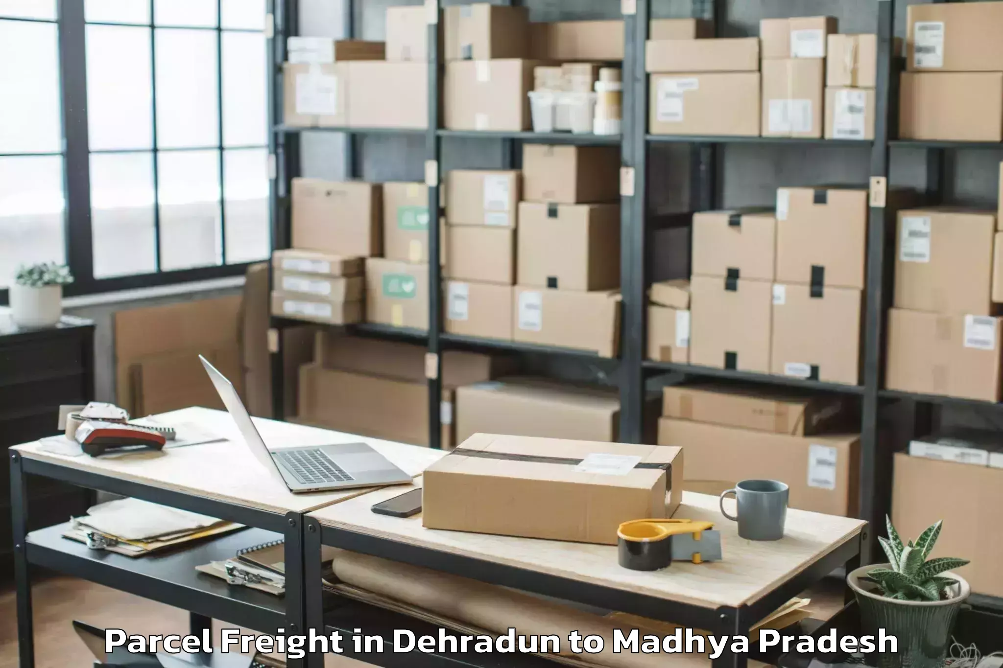 Top Dehradun to Dhar Parcel Freight Available